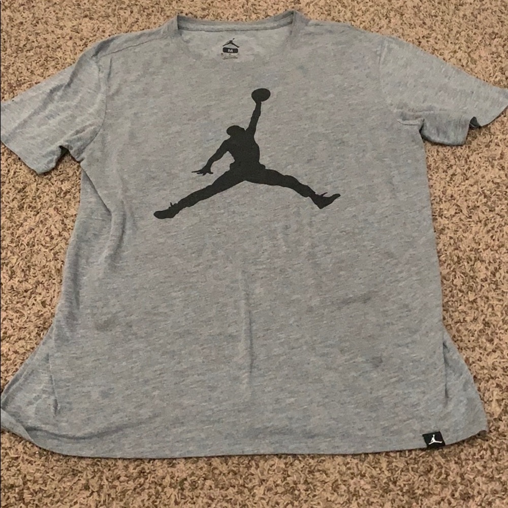 This is a shirt and the brand is Jordan